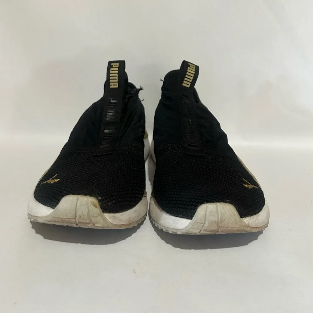 Puma Women’s Black and Gold Athletic Shoes